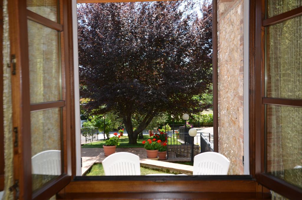 Aparthotel Casale Santa Caterina Amelia Habitación foto